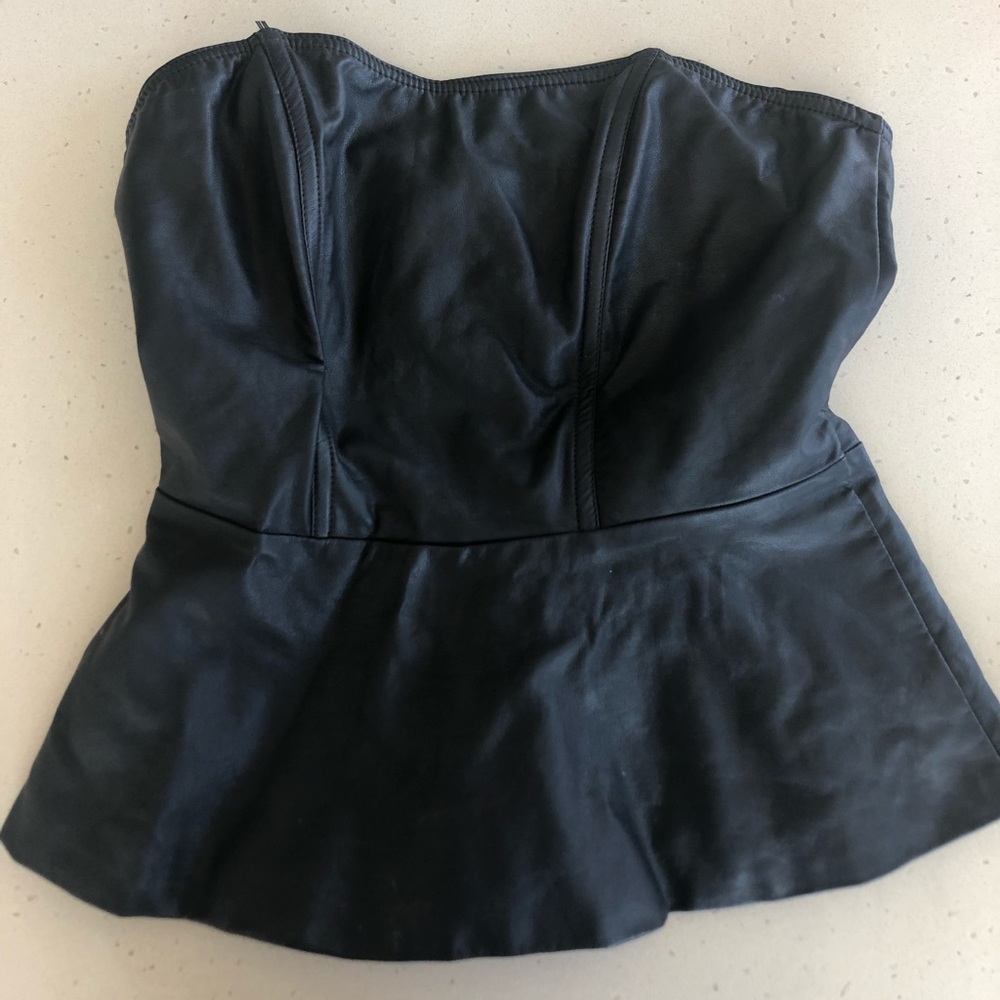 Sexy Express peplum sleeveless top black